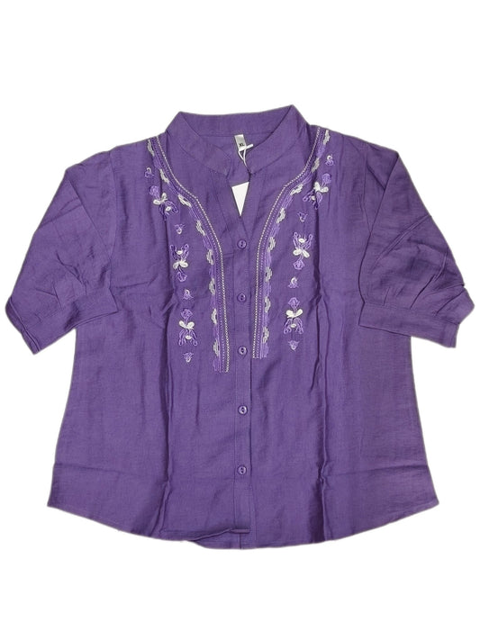 Maruti Western Wear fancy top featuring a stylish design and vibrant colors, displayed on a mannequin.