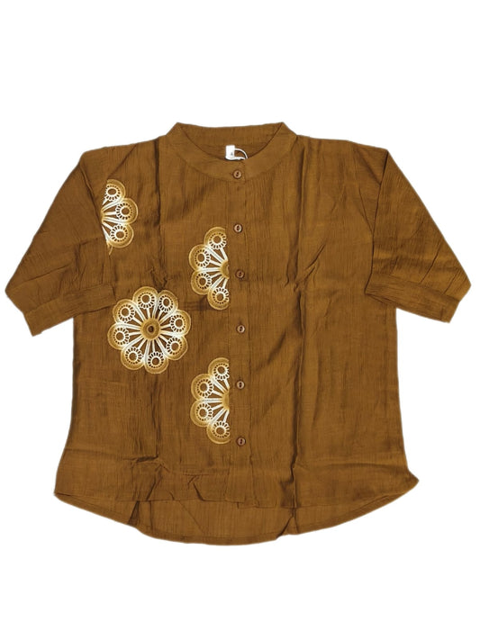 Maruti Western Wear fancy top featuring intricate design and stylish silhouette in a vibrant color.